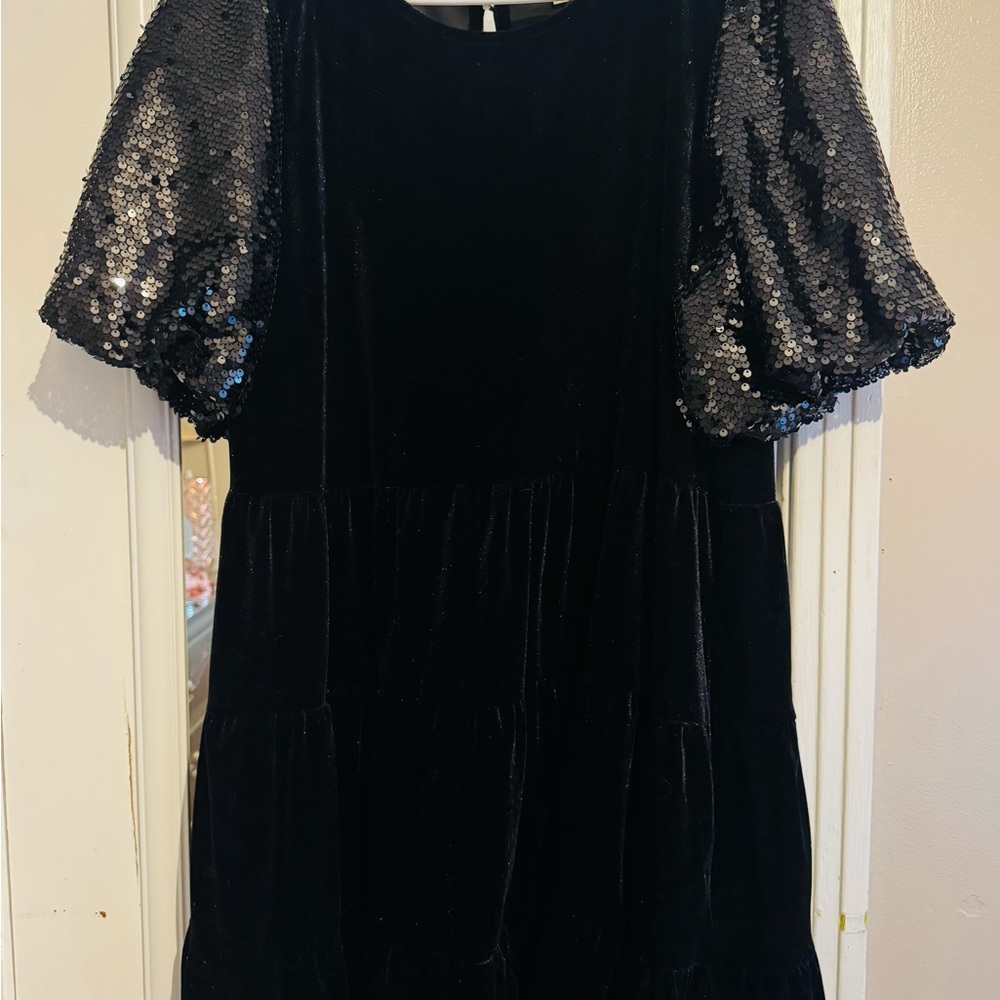 Elegant Black Dress with Sequin Sleeves